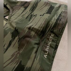 Size Medium Alphalete sports bra, hardly worn and in very good condition.